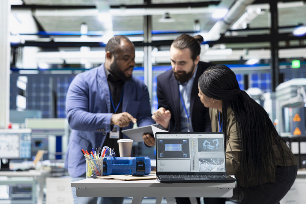 Multiethnic Specialists Engineers Doing Teamwork Modern Production Line 1024x683